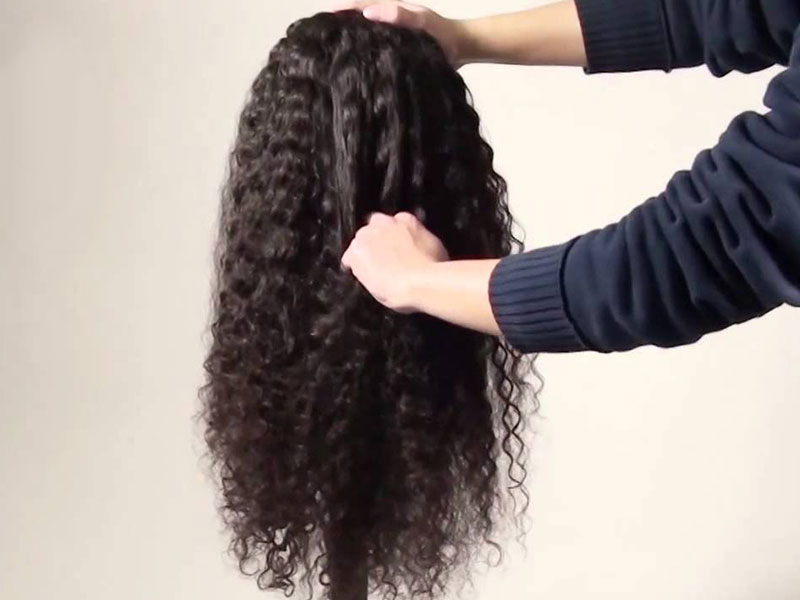 How to wash curly wig Step 1: Detangle your wig 