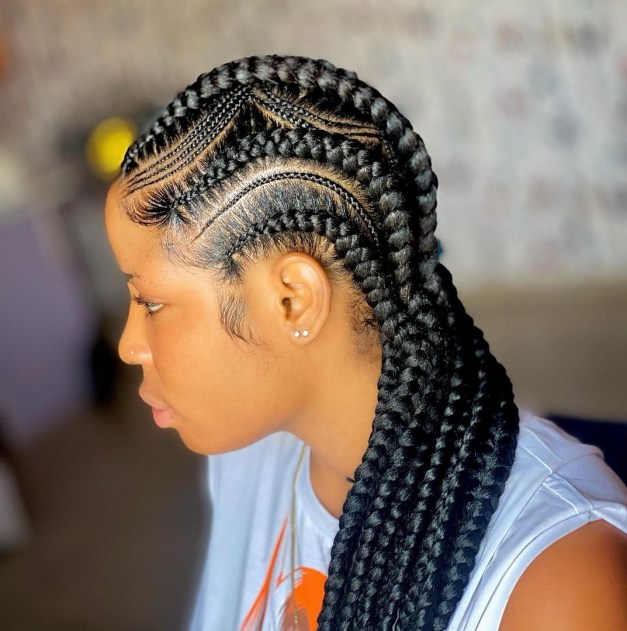 Pulled back cornrows braids