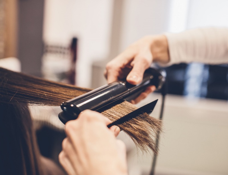 Straighten the hair using hair straightener